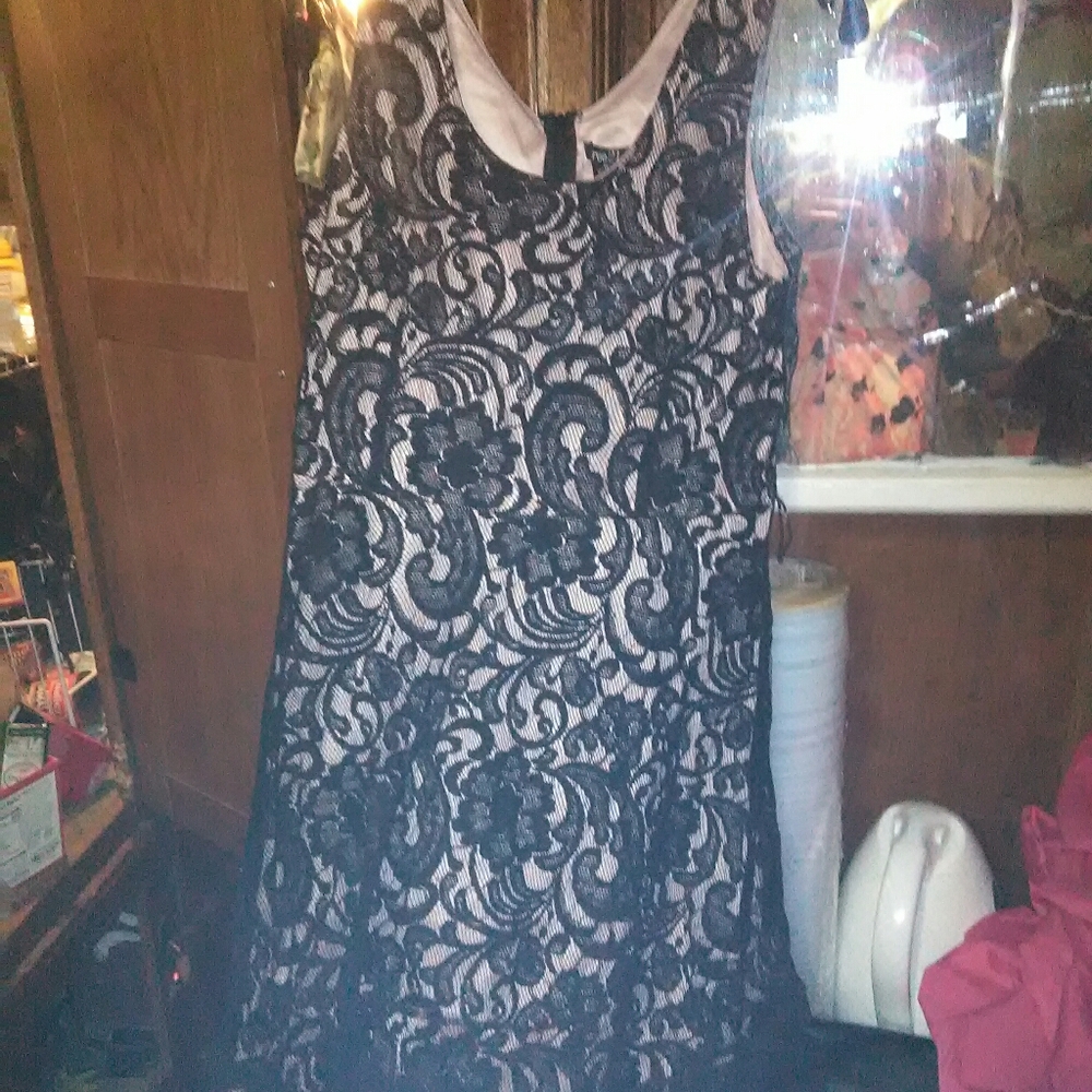Black lace over pink satin ruffled flouncy dress